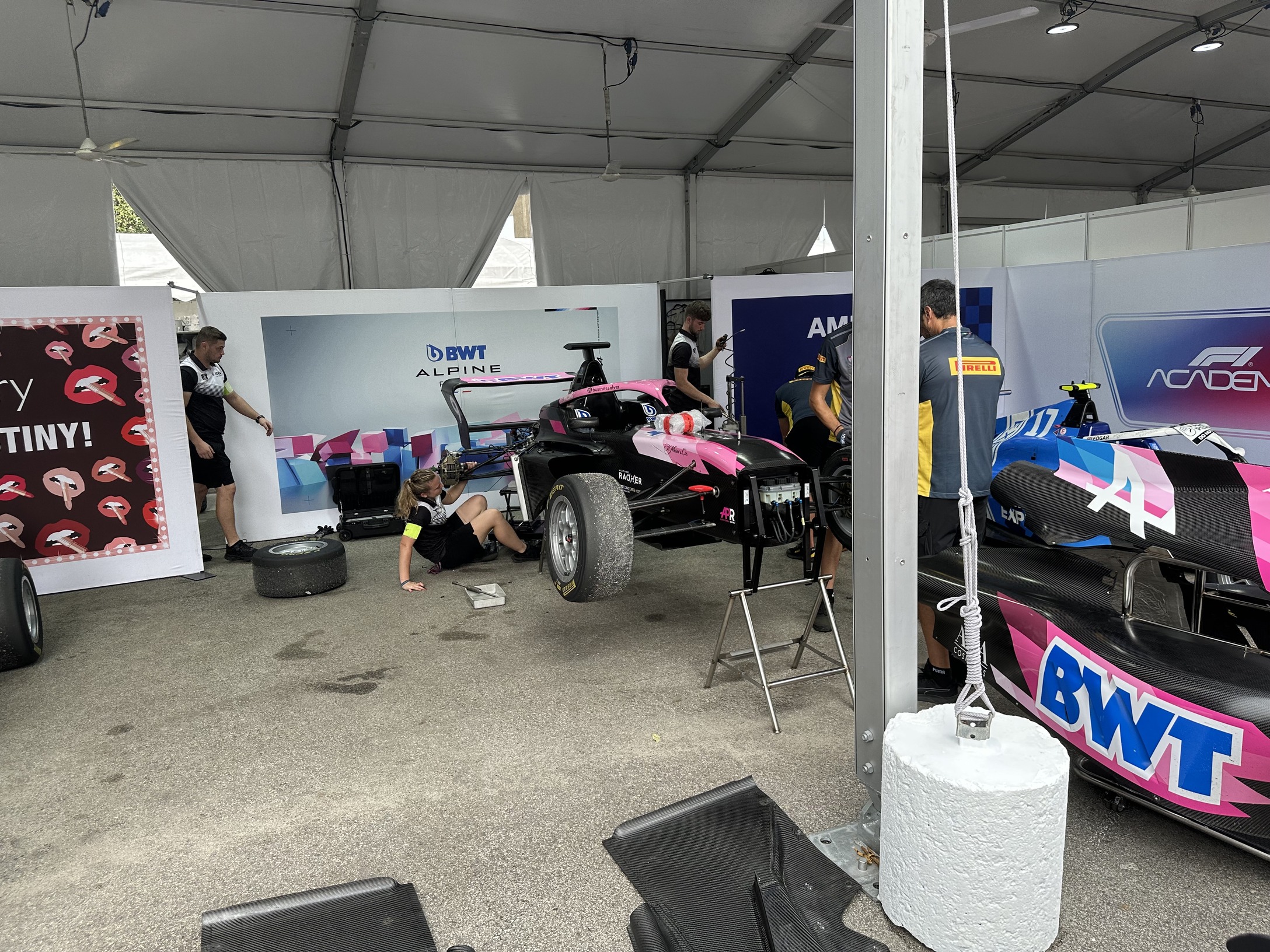 Pulling’s Tatuus F4 T-421 in the F1 Academy paddock at Singapore in 2024; a documentary photograph cropped for the Journal layout.