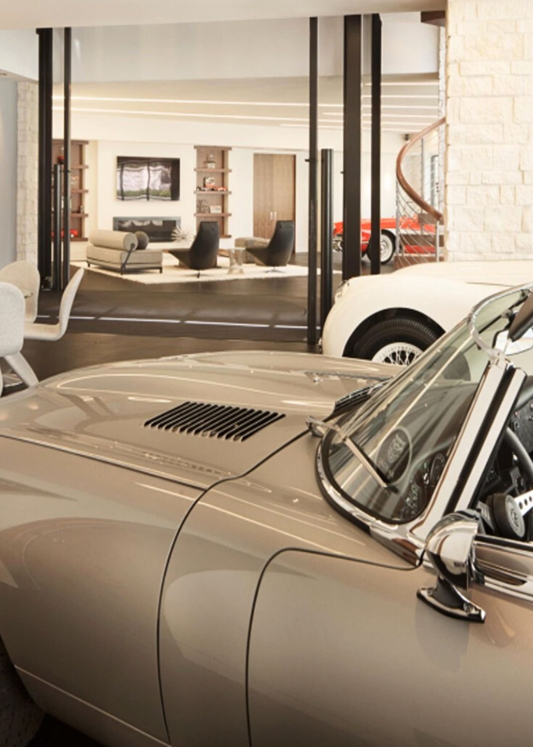 Conceptual collector loft with automobiles and mezzanine